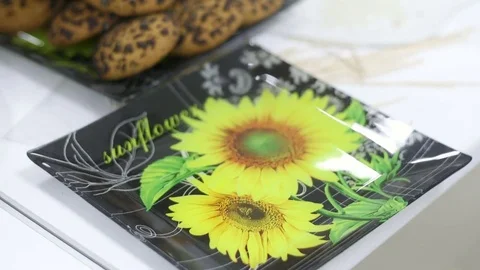 Close up zoom in handheld. Young caucasian girl put cookies from oven to white Видео 83271053