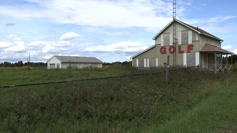 Closed and abandoned golf course and buildings Stock Footage 94595755