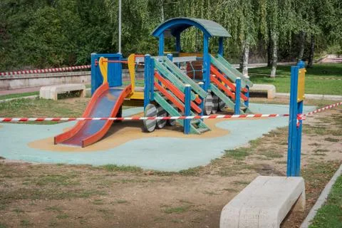 Closed and empty children playgrounds in Spain because of coronavirus, covid Stock Photos