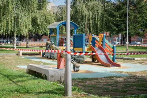 Closed and empty children playgrounds in Spain because of coronavirus, covid Stock Photos