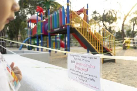 Closed and empty playgrounds in Lumpini public park, Bankok Thailand because  Stock Photos