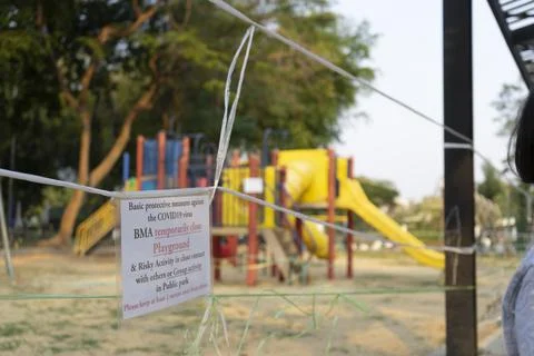 Closed and empty playgrounds in Lumpini public park, Bankok Thailand because  Stock Photos