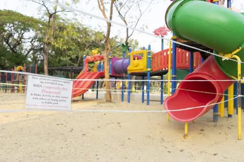 Closed and empty playgrounds in Lumpini public park, Bankok Thailand because  Stock Photos