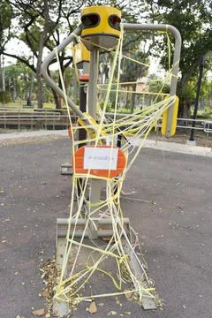 Closed and empty playgrounds in Lumpini public park, Bankok Thailand because  Stock Photos