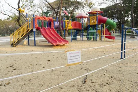 Closed and empty playgrounds in Lumpini public park, Bankok Thailand because  Stock Photos