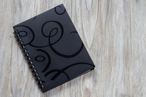 CLosed black notebook Stock Photos