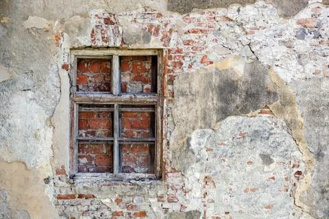 Closed blocked window and old stone wall background Foto stock