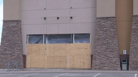 Closed boarded up abandoned large retail big box store Stock Footage 78734866