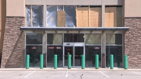 Closed boarded up abandoned large retail big box store Stock Footage 78735431