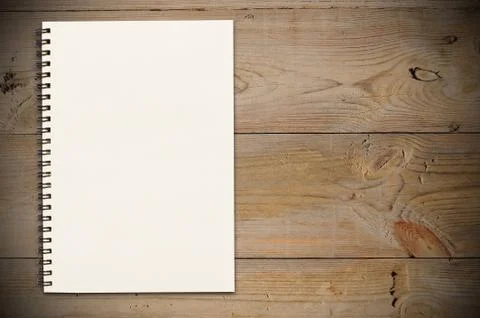 Closed book on table Stock Photos