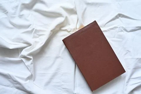 Closed book on a white background Stock Photos
