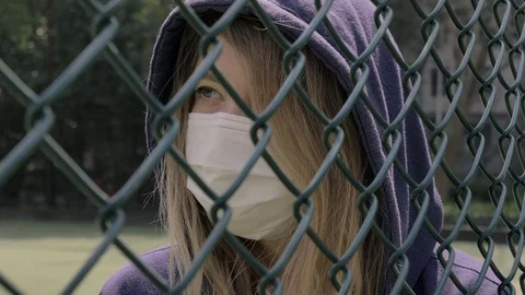 Closed border. Quarantine. Close-up of young woman wearing Protective Face Mask Stock Footage 126642985