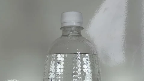 Closed Bottle Of Sparkling Water Stock Footage 134748693