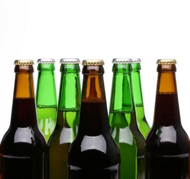 Closed bottles of beer isolated on a white background Stock Photos