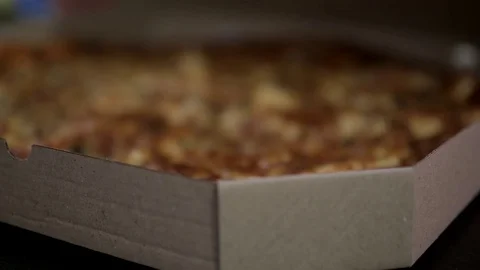 Closed box with a very hot pizza close-up Stock Footage 101201627