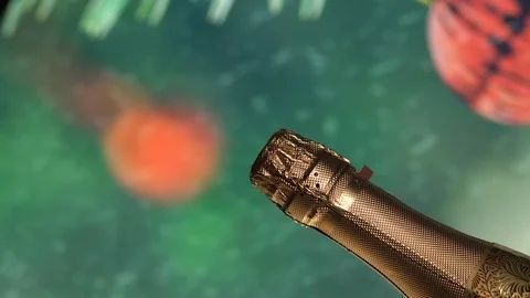 Closed champagne bottle. Winter background with snow. Invitation to the party. Stock Footage 111185349