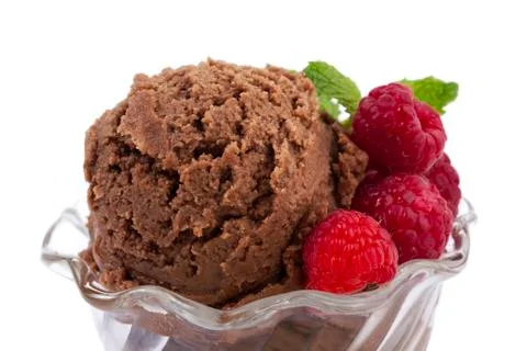 Closed up chocolate ice cream with raspberry and mint 写真素材