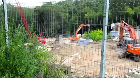 Closed construction site in the green area of the city Stock Footage 97267984
