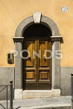 Closed door of a house, rome, rome province, lazio, italy Stock Photos