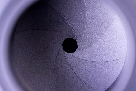 Closed down aperture on a manual camera lens Stock Photos