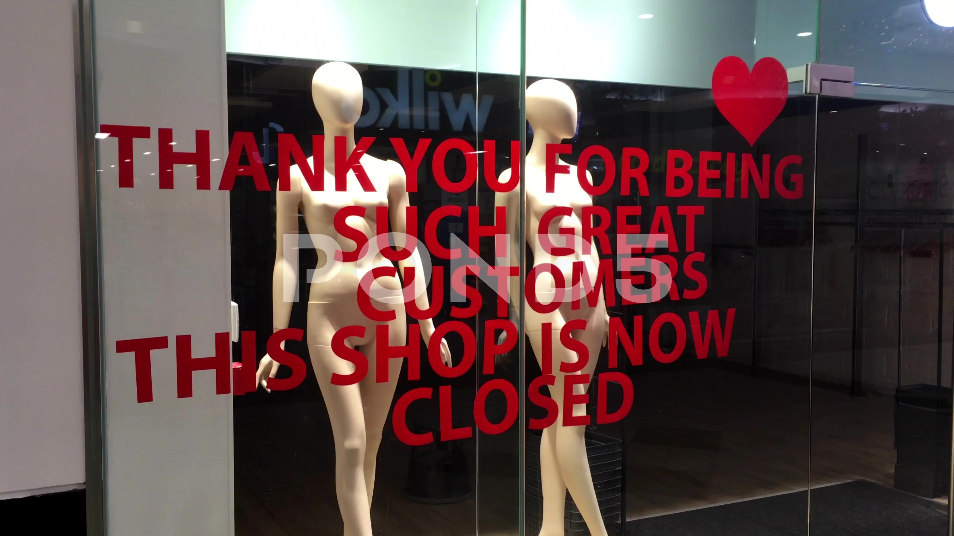 Closed down clothing store in Putney shopping centre