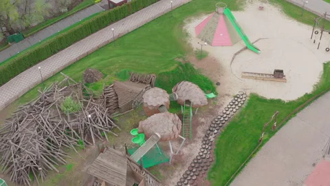 Closed empty children's colourful outside playground. pine cone slides. Stock Footage 153425038