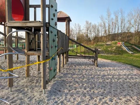 Closed empty children's playground during COVID pandemic Stock Photos