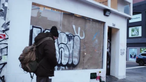 Closed Empty Storefronts and Graffiti in NYC - Smooth Pan Video stock 229915025