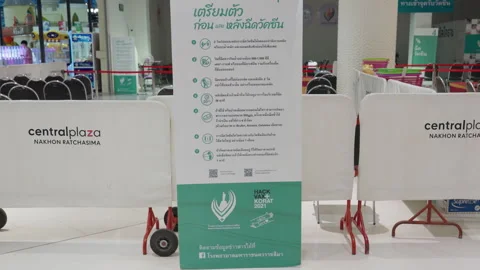 Closed &amp; Empty, Thailand Indoor Covid Vaccination Clinic Sign At Shopping Mall Stock Footage 256053355