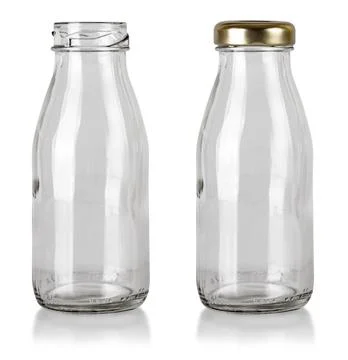 Closed empty transparent bottle isolated on the white background Stock Photos