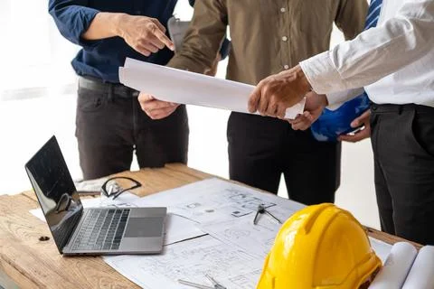 Closed up engineer meeting teamwork brain storm discussing for architectural Foto stock