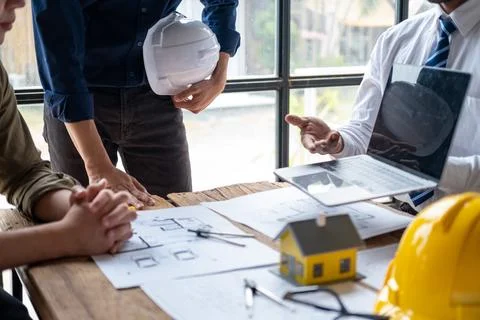 Closed up engineer meeting teamwork brain storm discussing for architectural Stock Photos