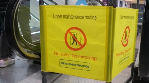 Closed escalator with sign - under maintenance. Stock Footage 288128519