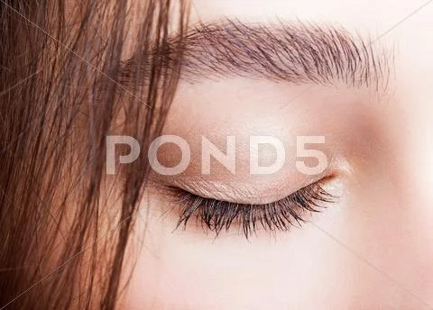 Closed female eye makeup Stock Photos