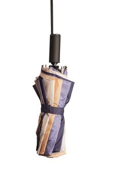 Closed folded umbrella hanging on string rope, isolated on white Stock Photos