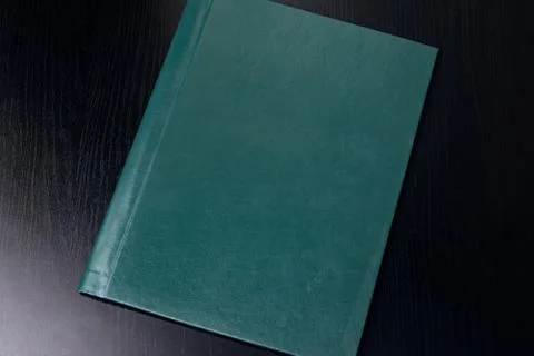 Closed folder for documents on wooden table Stock Photos