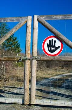 Closed gate stopsign Stock Photos
