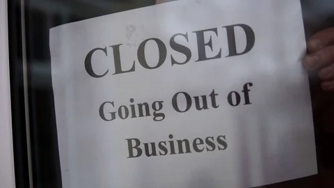 Closed Going Out Of Business Sign Placed At Store Front Window, 4K Recession Stock Footage