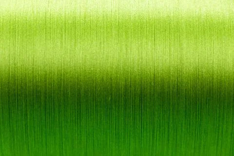 Closed up of green color of thread textured background (Focus at center of .. Illustrazione stock