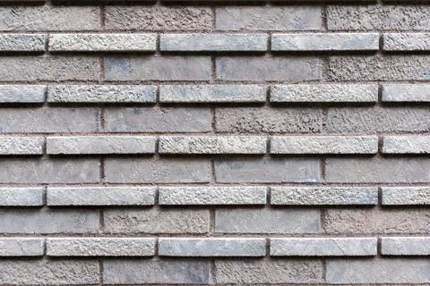Closed up grey brick wall texture. Stock Photos