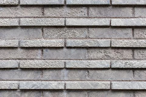 Closed up grey brick wall texture. Stock Photos