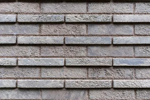 Closed up grey brick wall texture. Stock Photos