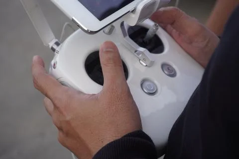 Closed up Hands holding drone controller. The hand operating the drone 스톡 사진