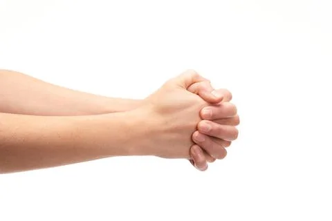 Closed hands one on another on white background, copy space Stock Photos