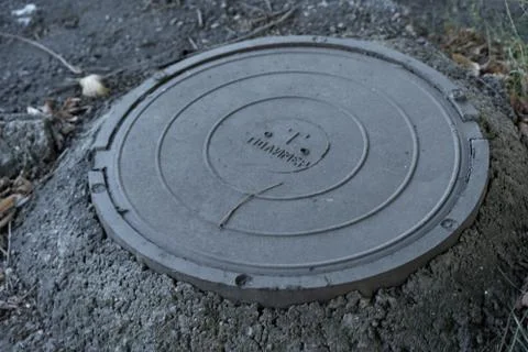 Closed hatch on the ground Stock Photos