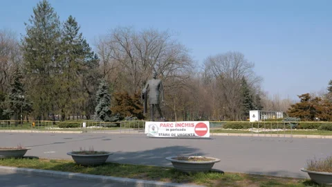 Closed Herastrau Park in Bucharest due to Coronavirus outbreak, Caution Tape Stock Footage 132278699