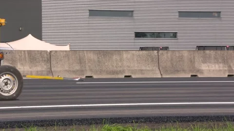 Closed highway. Marking machine enters frame applying road markings Stock Footage 139258859