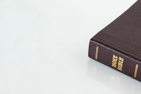 Closed Holy Bible Book Scripture on white background copy space for text Stock Photos