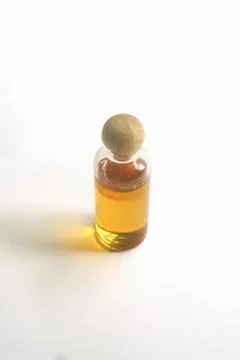 Closed up Honey in a small bottle. Stock Photos