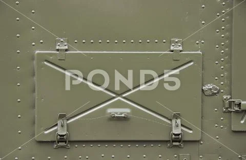 Closed iron hatch on Board the combat vehicle Stock Photos
